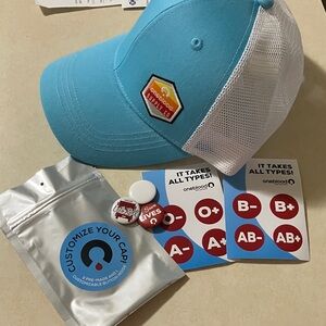 One Blood hat and buttons